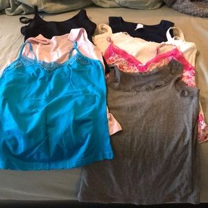 Lot of Seven Tank Tops Size Medium.